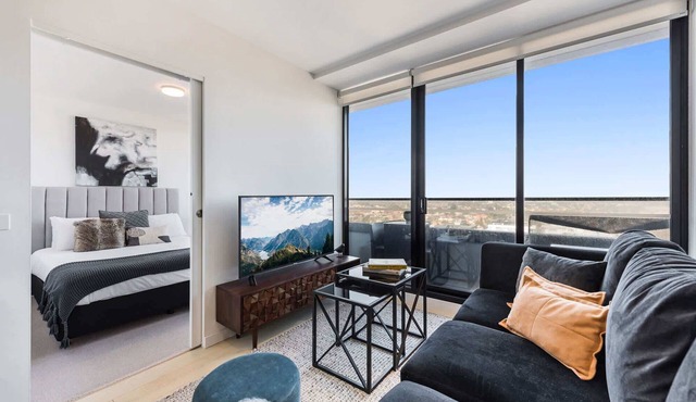 Chic 1-Bed with City Views, Parking, Gym & Pool