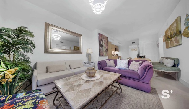 Chic 2-BD Downtown Condo with City & Water Views