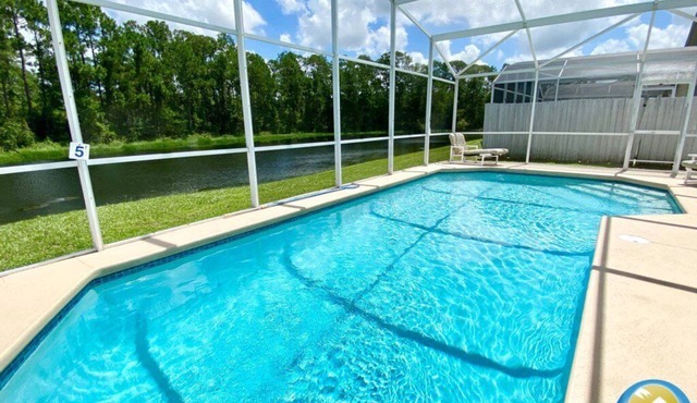 Chic 4-Bedroom Home w/Pool, Lake View, & Games Room - Minutes from Disney