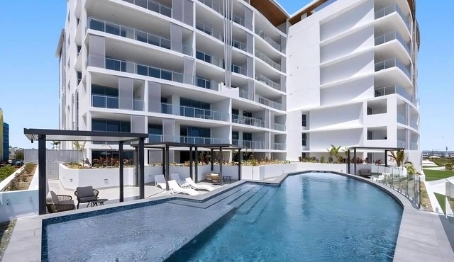 Chic Coastal Escape with Pool & Gym Access