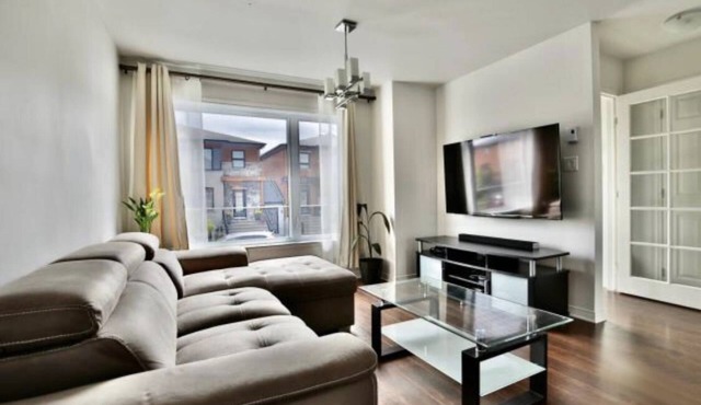 Chic Condo Comfort: Your Ideal Brossard Retreat Awaits