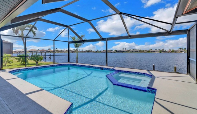 Chic Remodel! Gulf-Access Waterfront! Heated Pool, Kayak, Bikes & Over $125 of Free Daily Activities