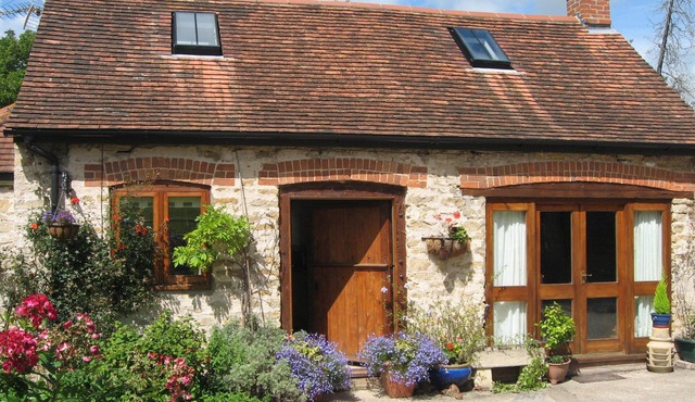 Chocolate box cottage in 8 acres of pasturland on Jurassic coatline of Dorset