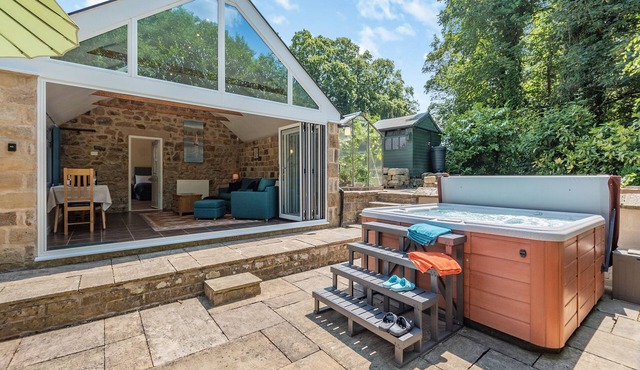 Church Cottage nestles in the grounds of the Old Vicarage in Darley Bridge.
