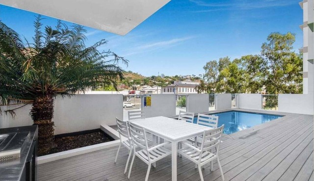 City convenience in Modern Townsville Apartment w secure parking, pool & views
