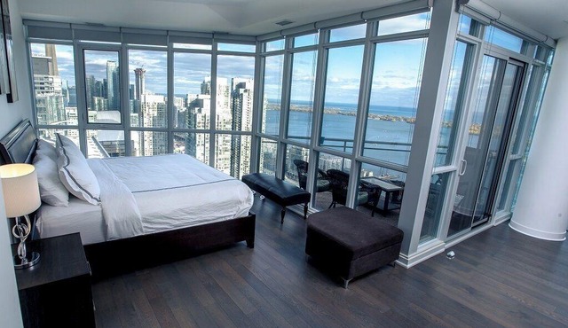 City/Lake view 2-storey condo w/parking