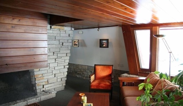 Clarance Gonstead Guest Cottage, Prairie Style, Stone & Tide Water Cypress