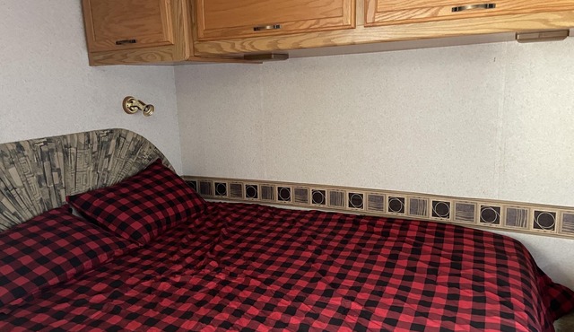 Class A motor home on large lot