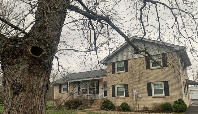 Classic 1970s split level on three acres in beautiful Arrington
