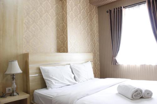 Classic 2BR Apartment at Mekarwangi Square Cibaduyut By Travelio