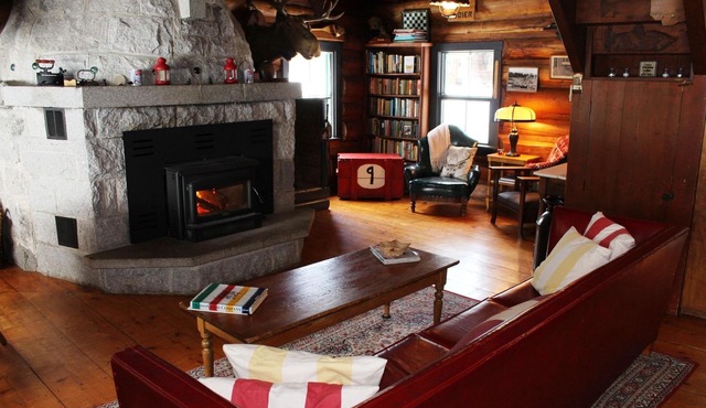 Classic Canadian Log home on a private lake, with acres to explore!