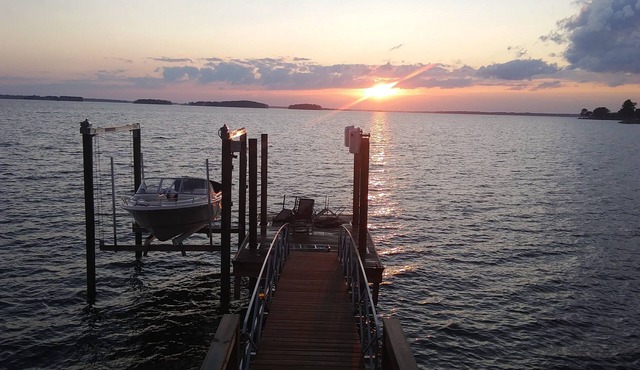 Classic lake cabin with one of best sunset views on the lake!