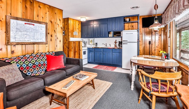 Classic, lakefront suite at a vintage resort with communal dock, firepit & views