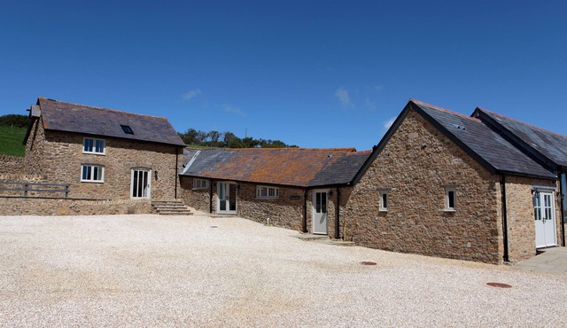Clayhanger Lodge is a spacious, converted detached barn