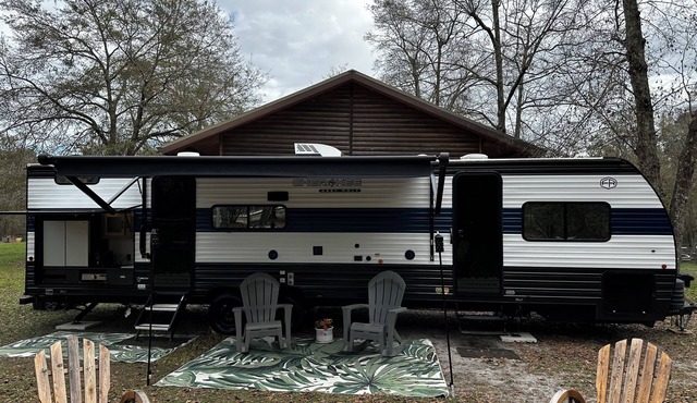 Clean 36’ 8” Travel Trailer on a small 5 acre farm. Bring the kids, room for 9!