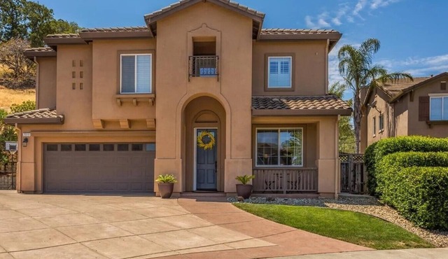 Clean and cozy bedroom in a beautiful Semi Custom home.