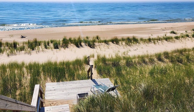 Clean, comfortable, casual cottage just steps from your own Lake Michigan beach