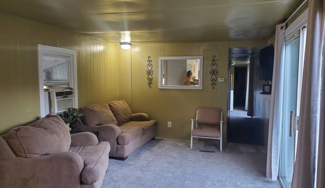 Clean old single-wide in Sand Lake, MI. Pet Friendly, near White Pine Trail