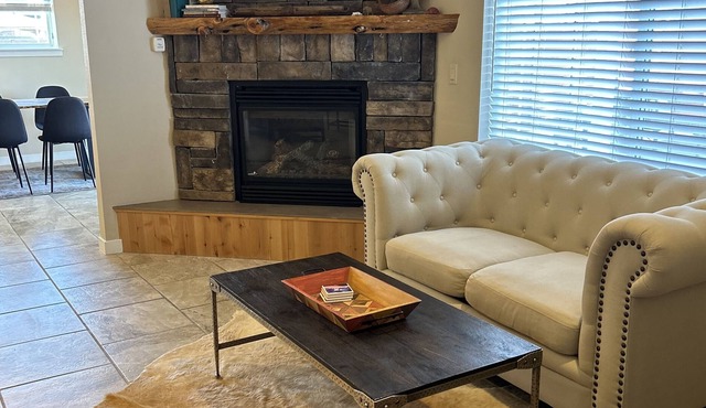 clean, stylish, relaxing home with hottub and fenced in backyard