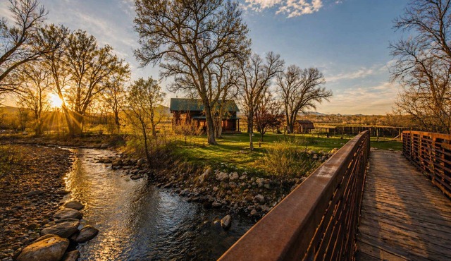 Clear Creek Crossing | Mountain Cabin on the Creek with Private Bridge Entry, BLM Land, Stargazing Deck + Separate Garage Apartment | Buffalo Wyoming Near Bighorn Mountains