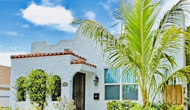 Close to beach & shopping & airport Charming Mission Style Home built in 1926.
