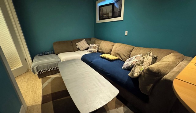 close to stampede, private room and bathroom in the basement, a small living