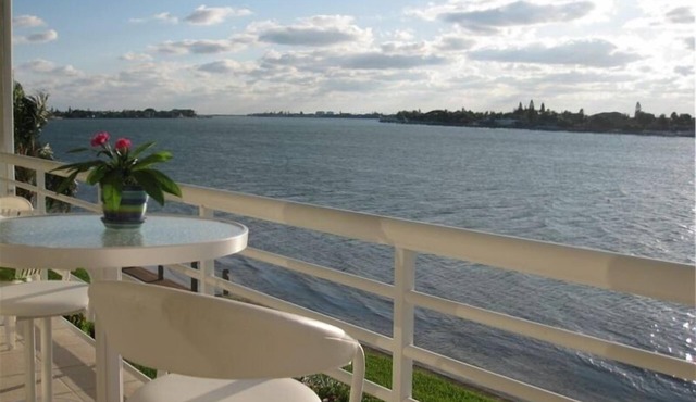CLUB BAHIA LUXURY WATERFRONT Condo View Sunsets, Dolphins, Manatee from balcony!