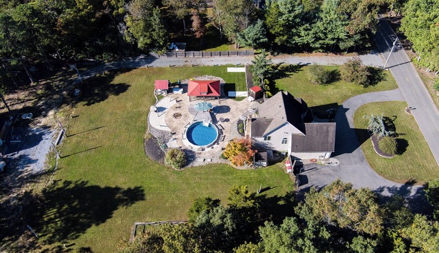 ClubDivot - A Modern Farm Style Home with Pool and Backyard Bar