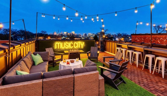 CMA Fest rooftop decks, skyline views, karaoke garage, game room near Broadway