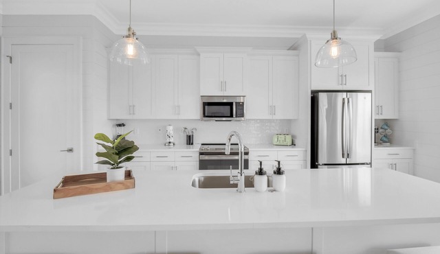 Coastal beach cottage steps away from the white sand beaches!