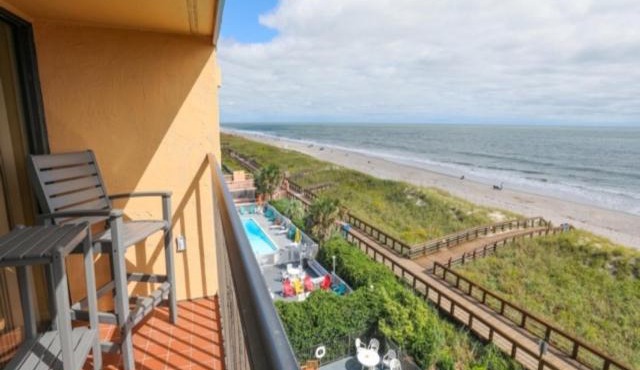 Coastal Cabana - Enjoy the gorgeous oceanfront sunrise from your 4th floor balcony, Walk to the Carolina Beach Boardwalk condo
