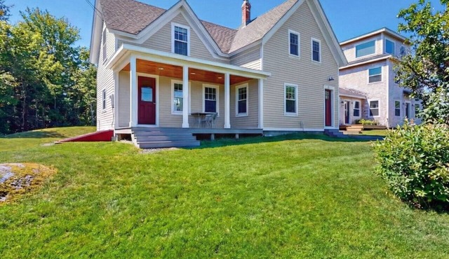 Coastal charm & harbor views just steps from Sand Cove Beach