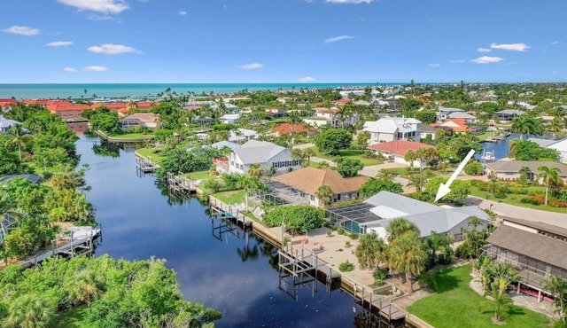 Coastal Charm: Pool Home on Canal on East End!