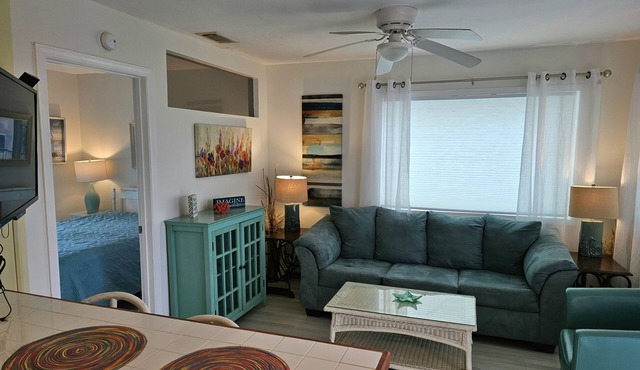 Coastal Chic beauty awaits you! Steps to the beach, super clean!