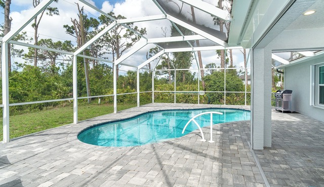 Coastal Comfort in Gulf Cove Relaxing 3BR Retreat w/Heated Pool