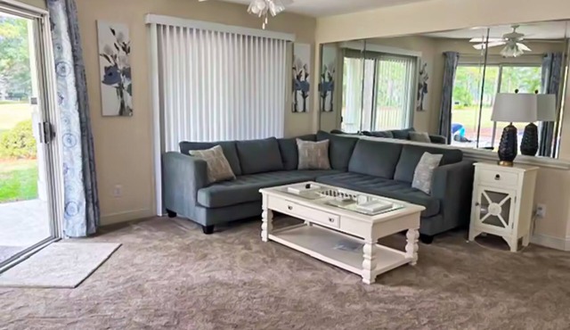 Coastal Condo with golf on-site, shared pool and fitness center