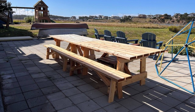 Coastal Cottage w/river frontage and just steps from the beach.