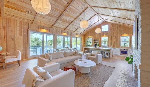 Coastal Escape with Direct Beach Access, Gourmet Kitchen, and Expansive Outdoor