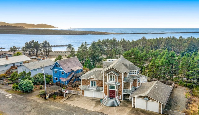 Coastal estate with private hot tub enclosed yard firepit and game room