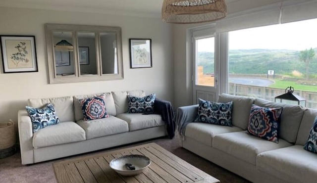 Coastal family home a stones throw from the beach.