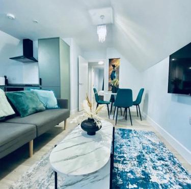 Coastal Flats with Garden & Parking near Castle