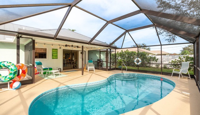 Coastal Getaway! Heated Pool, Private Patio, Fenced Yard, 5 miles to Beach!