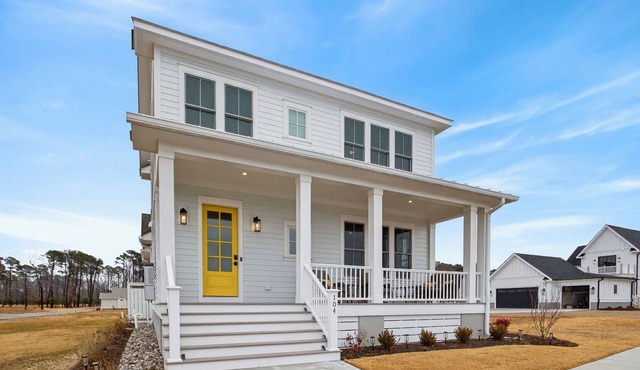 Coastal Green | Luxury Bayside Retreat at Bay Creek Resort & Club