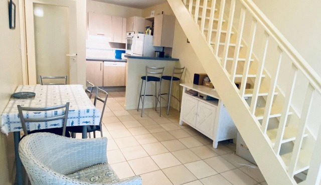 Coastal Haven: 2BR Apartment w/Mezzanine, Garage, Steps from Beach, Near Amenities