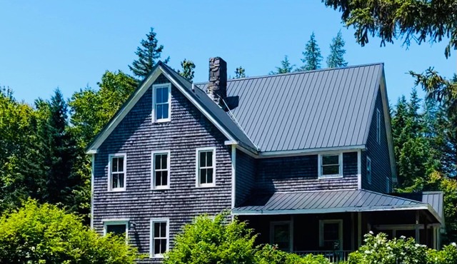 Coastal home near ocean with firepit, grill, lawn, deck