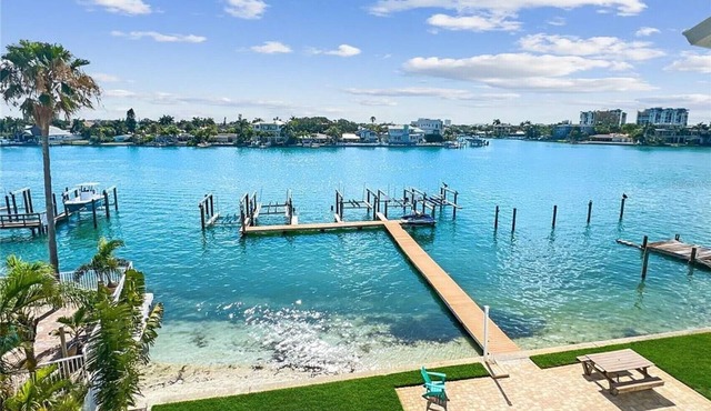 Coastal living with water views, sunrises, sunsets and boat slip