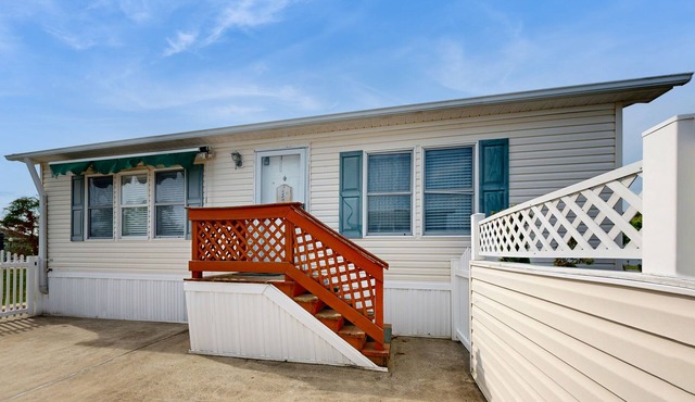 Coastal living with on-site pool, playground, grills, central AC, & washer/dryer