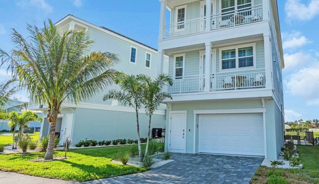 Coastal Luxe Villa! Tranquil 3-Story Retreat with Bay Views near Anna Maria Isl