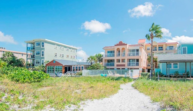 COASTAL RETREAT! Perfect Beach Location! Walk to Restaurants & More!