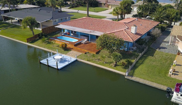 Cocoa Beach canal front heated pool villa